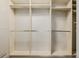 This walk-in closet features custom shelving and plenty of room for storage at 1848 W 68Th Ave, Denver, CO 80221
