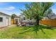 Spacious backyard with patio, firepit, and detached garage at 1111 E Dartmouth Ave, Englewood, CO 80113