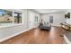Living room with hardwood floors and street view at 1111 E Dartmouth Ave, Englewood, CO 80113