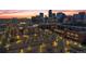 Aerial view of Coors Field and the surrounding Denver, Colorado cityscape at sunset at 2245 Blake St # L M N, Denver, CO 80205
