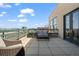 Spacious balcony with city views and seating area at 2245 Blake St # L M N, Denver, CO 80205