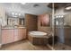 Spa-like bathroom with soaking tub and walk-in shower at 2245 Blake St # L M N, Denver, CO 80205