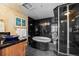 Elegant bathroom with soaking tub and glass shower at 2245 Blake St # L M N, Denver, CO 80205