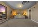 Bright bedroom featuring a large bed and city views at 2245 Blake St # L M N, Denver, CO 80205