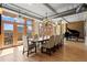Bright dining room with large table and hardwood floors at 2245 Blake St # L M N, Denver, CO 80205