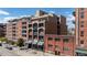 Condo building exterior, brick facade, urban setting at 2245 Blake St # L M N, Denver, CO 80205