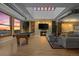 Game room with pool table, fireplace, and sunset views at 2245 Blake St # L M N, Denver, CO 80205
