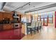 Modern kitchen featuring stainless steel appliances and breakfast bar at 2245 Blake St # L M N, Denver, CO 80205