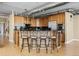 Modern kitchen with island, stainless steel appliances, and hardwood floors at 2245 Blake St # L M N, Denver, CO 80205