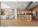 Kitchen with island, stainless steel appliances, and hardwood floors at 2245 Blake St # L M N, Denver, CO 80205