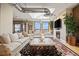 Living room with comfortable seating, city views, and fireplace at 2245 Blake St # L M N, Denver, CO 80205