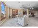 Elegant living area with seating arrangement and access to balcony at 2245 Blake St # L M N, Denver, CO 80205