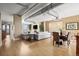 Open living area with hardwood floors, fireplace, and city views at 2245 Blake St # L M N, Denver, CO 80205