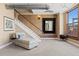 Relaxing living room with chaise lounge and brick accent wall at 2245 Blake St # L M N, Denver, CO 80205