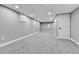 Spacious finished basement area with recessed lighting and neutral gray walls and carpet at 10431 Holland St, Broomfield, CO 80021