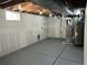 Unfinished basement with painted floor, ready for customization and storage at 10431 Holland St, Broomfield, CO 80021