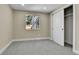 Cozy bedroom featuring neutral walls, carpet flooring, and a closet with sliding doors at 10431 Holland St, Broomfield, CO 80021