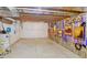 Unfinished basement offers potential with exposed ceiling and walls ready for personalized updates at 2723 Grove St, Denver, CO 80211
