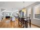 Open floor plan featuring a modern kitchen, dining area, and living space at 2723 Grove St, Denver, CO 80211
