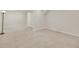 Spacious basement featuring carpeting and neutral paint, offering versatility for various uses at 3890 S Atchison Way # B, Aurora, CO 80014