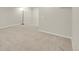 Basement space with neutral paint and carpeting provides ample room for customization at 3890 S Atchison Way # B, Aurora, CO 80014