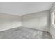Bright bedroom with neutral paint, carpeting, and a window offering ample natural light at 3890 S Atchison Way # B, Aurora, CO 80014