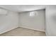 Cozy bedroom featuring carpeted flooring and natural light through the window at 3890 S Atchison Way # B, Aurora, CO 80014