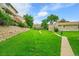 Beautifully maintained lawn and landscaping surrounding these townhomes at 3890 S Atchison Way # B, Aurora, CO 80014
