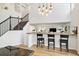 Dining Area with bar seating that is open to the living area at 3257 Cummings Dr, Erie, CO 80516