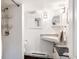 Bathroom features shower, sleek vanity, updated fixtures, and modern design at 4452 Stuart St, Denver, CO 80212