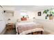Cozy bedroom with decor, natural lighting, and neutral tones at 4452 Stuart St, Denver, CO 80212