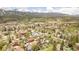 Stunning aerial view of Breckenridge homes nestled amongst green trees, offering beautiful mountain scenery at 105 S High St # A, Breckenridge, CO 80424