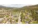 Expansive aerial view of homes, roads and green trees from a mountain neighborhood at 105 S High St # A, Breckenridge, CO 80424