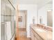 Bathroom with a shower, granite vanity, and tiled floor at 105 S High St # A, Breckenridge, CO 80424