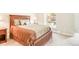 Bedroom with a wooden bed frame and neutral decor at 105 S High St # A, Breckenridge, CO 80424