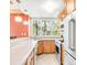 Well-lit kitchen featuring granite countertops, stainless steel appliances, and a large window at 105 S High St # A, Breckenridge, CO 80424