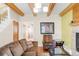 Comfortable living room with a fireplace, wooden accents, and inviting seating arrangements at 105 S High St # A, Breckenridge, CO 80424