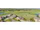 Aerial view of the beautiful community, manicured lawns, mature trees and golf course at 2600 Reserve Ct, Erie, CO 80516