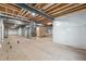 Unfinished basement featuring exposed ceiling and beams, wrapped support columns and plumbing at 2600 Reserve Ct, Erie, CO 80516