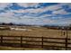 Scenic community featuring golf course with snow-capped mountains in the background at 2600 Reserve Ct, Erie, CO 80516