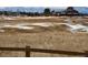 Scenic community featuring golf course with snow-capped mountains in the background at 2600 Reserve Ct, Erie, CO 80516