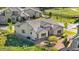Exterior view featuring a fenced yard, stone accents, and lovely landscaping at 2600 Reserve Ct, Erie, CO 80516