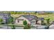 Inviting exterior showcasing manicured front lawn, and lush landscaping and traditional architectural style at 2600 Reserve Ct, Erie, CO 80516
