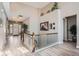 Bright foyer featuring a soaring ceiling, hardwood floors, stairway and decorative accents at 2600 Reserve Ct, Erie, CO 80516