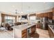 Spacious kitchen with granite countertops, stainless steel appliances, and an open layout at 2600 Reserve Ct, Erie, CO 80516
