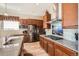 Gourmet kitchen features stainless steel appliances, granite countertops, double ovens, gas range and ample cabinets at 2600 Reserve Ct, Erie, CO 80516