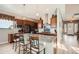 Modern kitchen with granite countertops, stainless steel appliances, and breakfast bar at 2600 Reserve Ct, Erie, CO 80516