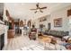 Open concept living room and kitchen area with hardwood floors and great natural light at 2600 Reserve Ct, Erie, CO 80516