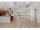 Open-concept living area with soaring ceilings, wood floors, and contemporary finishes at 2600 Reserve Ct, Erie, CO 80516