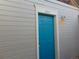 Close-up view of the bright blue front door of a home at 1405 Broadway St # 302, Boulder, CO 80302
